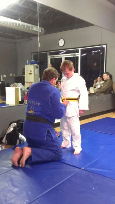 Bryant with the yellow/black belt